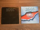 Original vinyl AC/DC albums Back In Black and The Razors Edge.