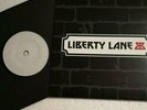 STATUS QUO - LIBERTY LANE / BACKBONE - UK 7
