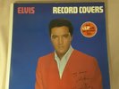 Elvis Book of Record Covers and Vinyl with Greatest Hits