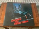 Escape from New York. Mint, opened, cleaned but never played.