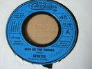 genesis man on the corner uk BLUE LABEL 7
