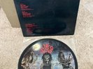 slayer live undead vinyl includes clear plastic inner sleeve.