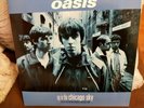 Oasis Coloured Vinyl 2LPs Up in the Chicago Sky