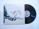 AUTOGRAPHED ERIC CLAPTON SLOWHAND LP SIGNED RSO POLYGRAM 1977