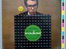 Elvis Costello - This Year's Model   1st Press Etch Vinyl LP + 7” Bonus + Badge