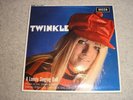 TWINKLE. A LONELY SINGING DOLL. 7