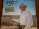 * George Strait Ocean Front Property LP Record Vinyl Album In The Shrink Wrap.
