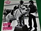 THE JOY OF PIGS = Serious Drinking Vinyl LP, German Rebel Rec 1984 EX+