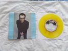 ELVIS COSTELLO WATCHING THE DETECTIVES BELGIUM YELLOW BROWN MARBLE VINYL 7 INCH