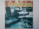 Disque vinyle lp UNIDA. Coping With The Urban Coyote