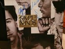 Simple Minds - .Once Upon A Time. Signed by 4. Excellent condition. Sleeve only.
