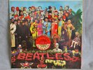 Beatles Sargent Pepper LP album with sleeve.