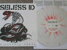 Useless ID ?– Most Useless Songs Vinyl LP - White/Red Splatter. FAT WRECK CHORDS