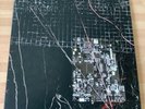 Merzbow / Prurient - Black Crows Cyborg - Limited Red/Black Splatter 12” Vinyl