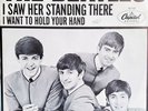 The Beatles 45 record I WANT TO HOLD YOUR HAND, Capitol  with original Sleeve