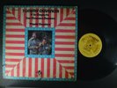 TOMMY OLIVENCIA con CHAMACO RAMIREZ Plante Bandera LATIN LP INCA