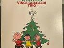 A Charlie Brown Christmas.  Vince Guaraldi Trio. 1988 Green Vinyl Press F-8431