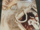 madonna 12 in remix MATERIAL GIRL/ PRENTENDER lp version.