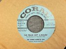 The Johnny Burnette Trio Train Kept A-Rollin' / Honey Hush 7