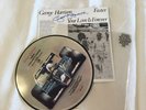 George Harrison signed record