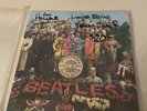 The Beatles Sgt Peppers Lonely Hearts Club Band LP Yellow Vinyl Holland Nr Mint?