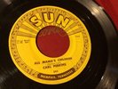 Carl Perkins. “Boppin’The Blues/all Mama’s Children” 45 SUN