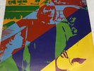 John Wetton ‎– Caught In The Crossfire - VINYL LP