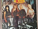 Vixen - Rev it Up MTL1054 EMI USA 12 inch Vinyl Record