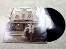 VINYL ALBUM RECORD,RANDY TRAVIS -  STORMS OF LIFE, DIGGING UP BONES,25435-1,1986