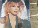 Olivia Newton John Toughen Up.  Maxi vinyle. Neuf.