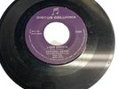 Vintage 7” vinyl record 45 RPM Gerardo Reyes Libro abierto donde caigo