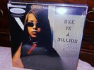 Aaliyah - One in a Million (Coke Bottle Green/Bone Galaxy) Ltd Edition
