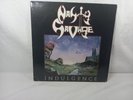 Nasty Savage - Indulgence RR 9630 Metal Blade Records Very Good + Condition
