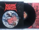 NUCLEAR ASSAULT - HANDLE WITH CARE (1989) LP - 1ST PRESS  EX  SIGNED BY THE BAND
