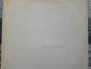 The White album by the Beatles. Pristine UK 1st top loader no EMI statement