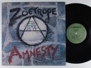 ZOETROPE Amnesty COMBAT LP VG++ with merch insert o