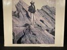 DWIGHT YOAKAM “Just Lookin' For A Hit” LP Reprise 1-25989 In shrink vinyl nm