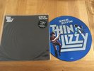 Thin Lizzy-The boys are back in town.12