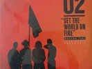 U2 – Set The World On Fire        New 2-LP  in seal.    Orange Vinyl