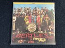 The Beatles LP Sgt. Peppers Lonely Hearts Club Band Pink/Gray Marble/Cut-out Ins