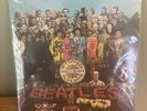 4 beatles records frkm the 2014 Beatles in Mono Vinyl box set. Sealed