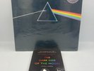 Pink Floyd Dark Side of The Moon vinyl with stickers, posters, book & comic