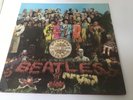 The Beatles Sgt Pepper LP 2nd press excellent example.