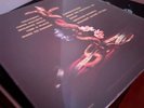 QUEENS OF THE STONE AGE - IN TIMES NEW ROMAN GLOW IN THE DARK VINYL