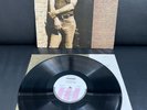 CALVIN RUSSELL / A crack in time - LP- Vinyl: near mint / Cover: near mint-