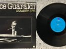 Vince Guaraldi – Greatest Hits ; 1980 LP  (VINYL IS EX)