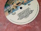 Kiss. Rock and Roll Over vinyl Lp New Marble Pink/red/white + Poster.