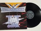 T.T. Quick: Metal Of Honor, Island 90521-1, TT US 1986 DMM, VG/VG+
