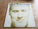 The Smiths LP Strangeways Here We Come plays EX with inner embossed sleeve