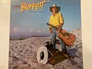 Jimmy Buffett “Riddles in the Sand” Vinyl Record 1984 (First Press) VG+